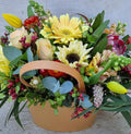 Not A Basket Case! Mixed seasonal blooms